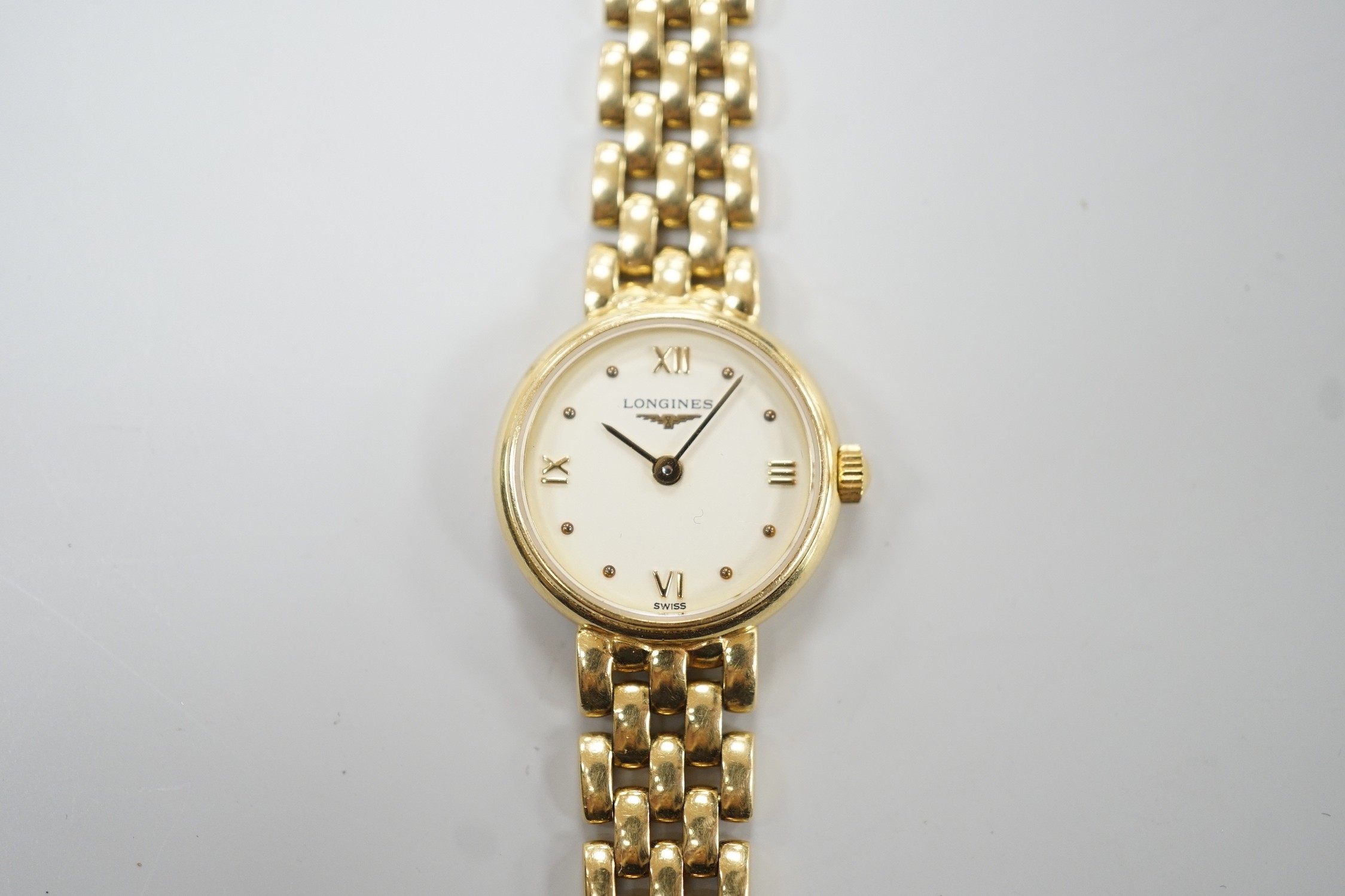 A lady's 2001 18ct gold Longines quartz wrist watch, on an 18ct gold Longines bracelet, overall length 18cm, gross weight 29.2 grams, with box and papers.